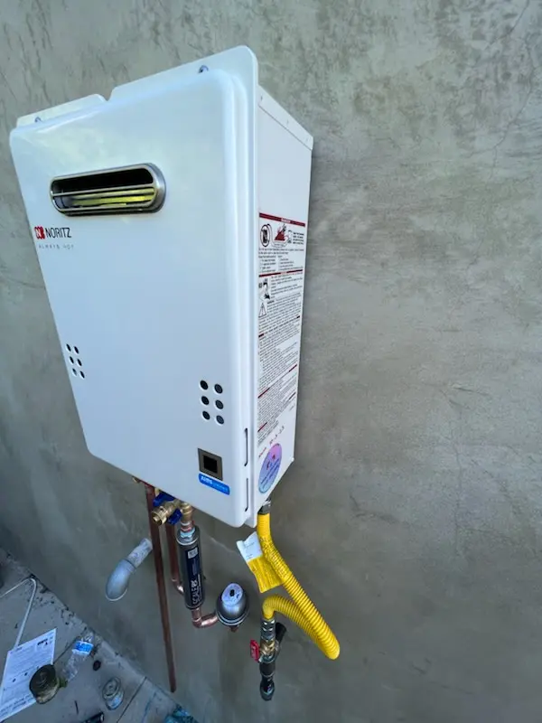 Tankless water heater installation for Ashton Manor homes